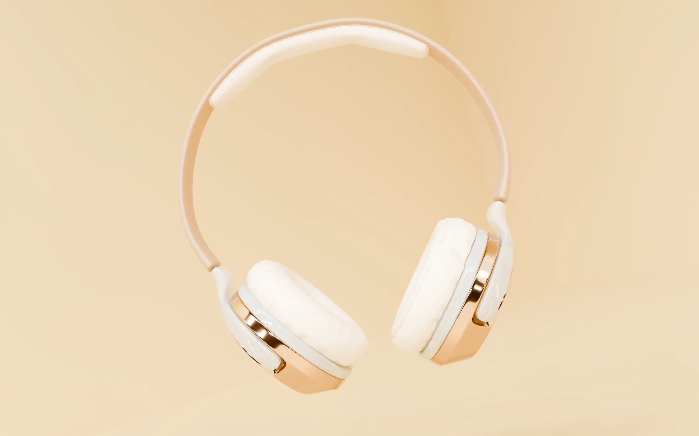 BQ-01 headphones seen from the front, floating above a soft shadow on a warm cream ground